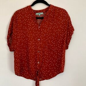 Karlie burnt orange/red polka dot buttondown with tie in front. Size small. $25